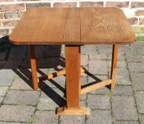 Small light oak drop leaf table