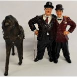 Leather horse and Laurel and Hardy figure
