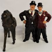 Leather horse and Laurel and Hardy figure