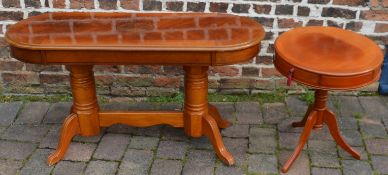 Regency style oval occasional table and a drum table