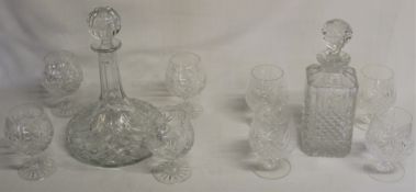 Crystal glass ships decanter with 4 glasses and another decanter with 4 glasses