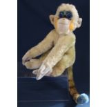 1950s / 1960s Steiff Mungo Monkey, straw filled with ear button, seated height 31cm