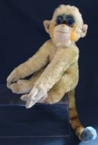 1950s / 1960s Steiff Mungo Monkey, straw filled with ear button, seated height 31cm