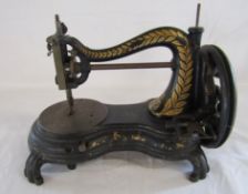 Jones (possibly)  hand crank cat back swan neck sewing machine mid-late 19th century - shuttle