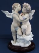 Lladro figurine "Heaven & Earth"  with wooden plinth, No. 1824, signed to base, boxed, 29.5cm x