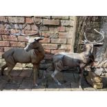 Pair of cast alloy stag garden ornaments (one with broken antler)  Ht approx. 83cm L 54cm