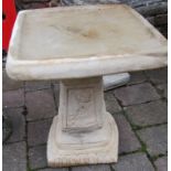 Square concrete bird bath with rose decoration