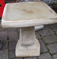 Square concrete bird bath with rose decoration