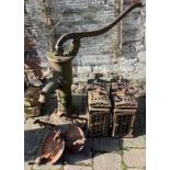 4 cast iron Chinese garden lanterns, water pump & a pair of bird bath wall brackets