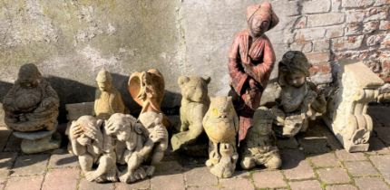 Collection of garden ornaments including Buddha, 3 wise monkeys, etc & a bench support