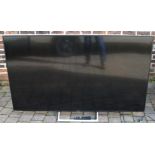 Modern 75 inch Sony 75XE8596 TV with remote