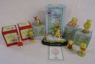 6 Royal Doulton Winnie the Pooh figurines - Winnie the Pooh - and the present, in the armchair,