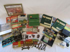 Collection of tractor manuals, tin of keys, Dunlop and Romac puncture repair tins (some with