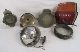 Collection of car lights includes Lucas LR 6, Howes & Burley, Ford etc