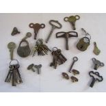 Collection of keys includes watch, MET TOY, clock, padlock etc