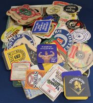 Quantity of vintage beer mats in an old chocolate box