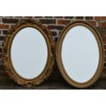 Two oval wall mirrors