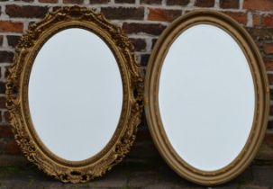 Two oval wall mirrors