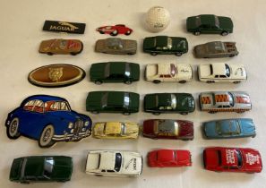 Collection of Jaguar diecast cars, badges and a Jaguar golf ball