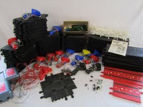 Large collection of Scalextric track, controllers includes 'Race-Tuned', power units and parts