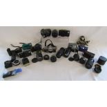 Collection of cameras includes le clic, Canon, Olympus and lenses includes super-paragon, tefnon,