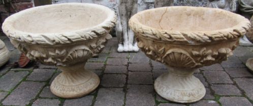 Pair of concrete acanthus pattern garden urns