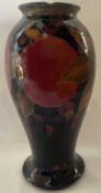 William Moorcroft vase of inverted baluster form with pomegranate design, (chip to rim)