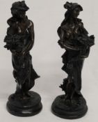 Two bronze effect figurines, height 28cm