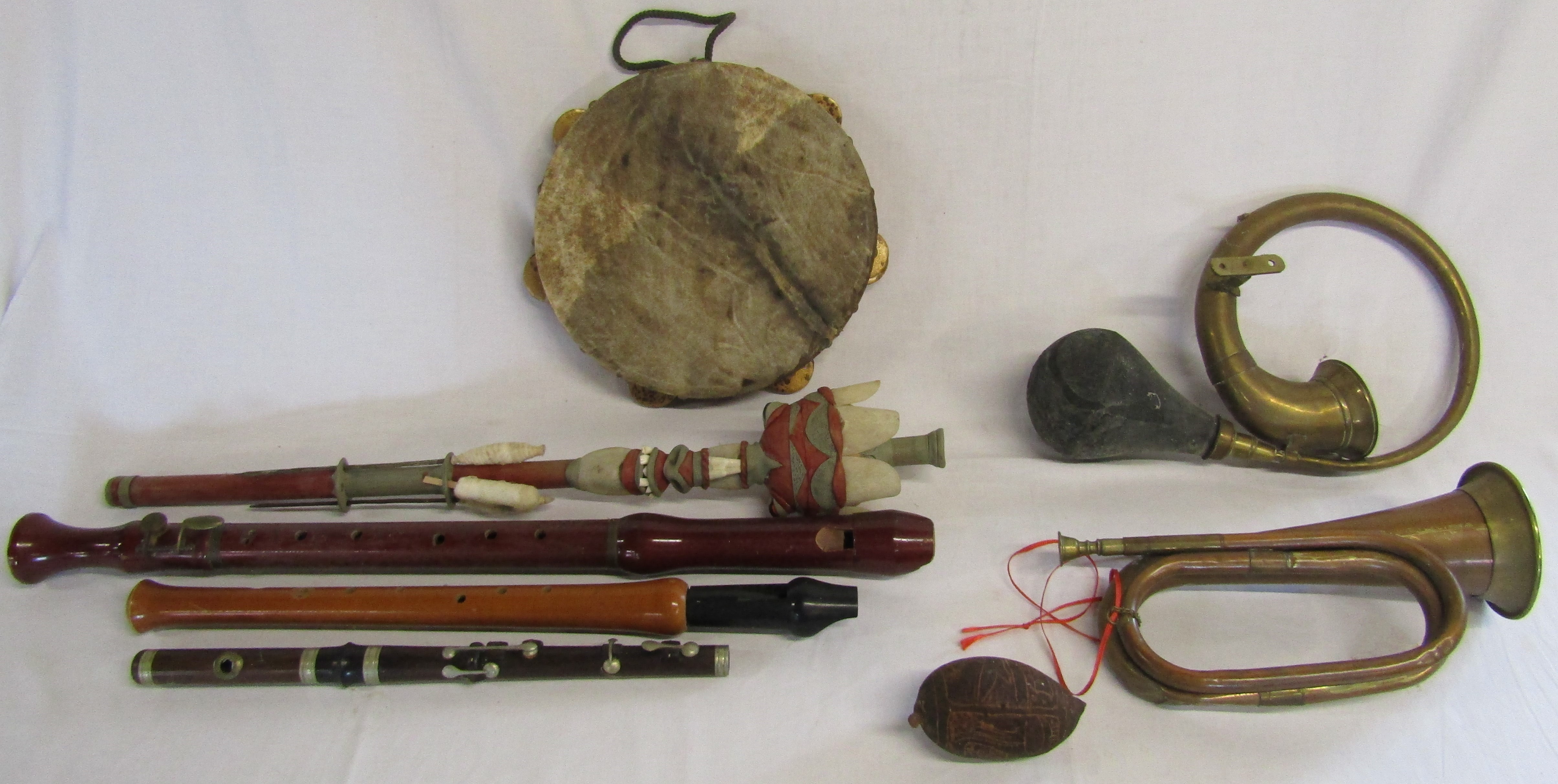 Musical instruments including tambourine, recorder, copper and brass bugle, shaker, Constanta