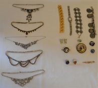 Selection of costume jewellery, including various necklaces, enamel and porcelain brooches, silver