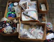Large selection of haberdashery items including reels of thread, patterns, material etc.
