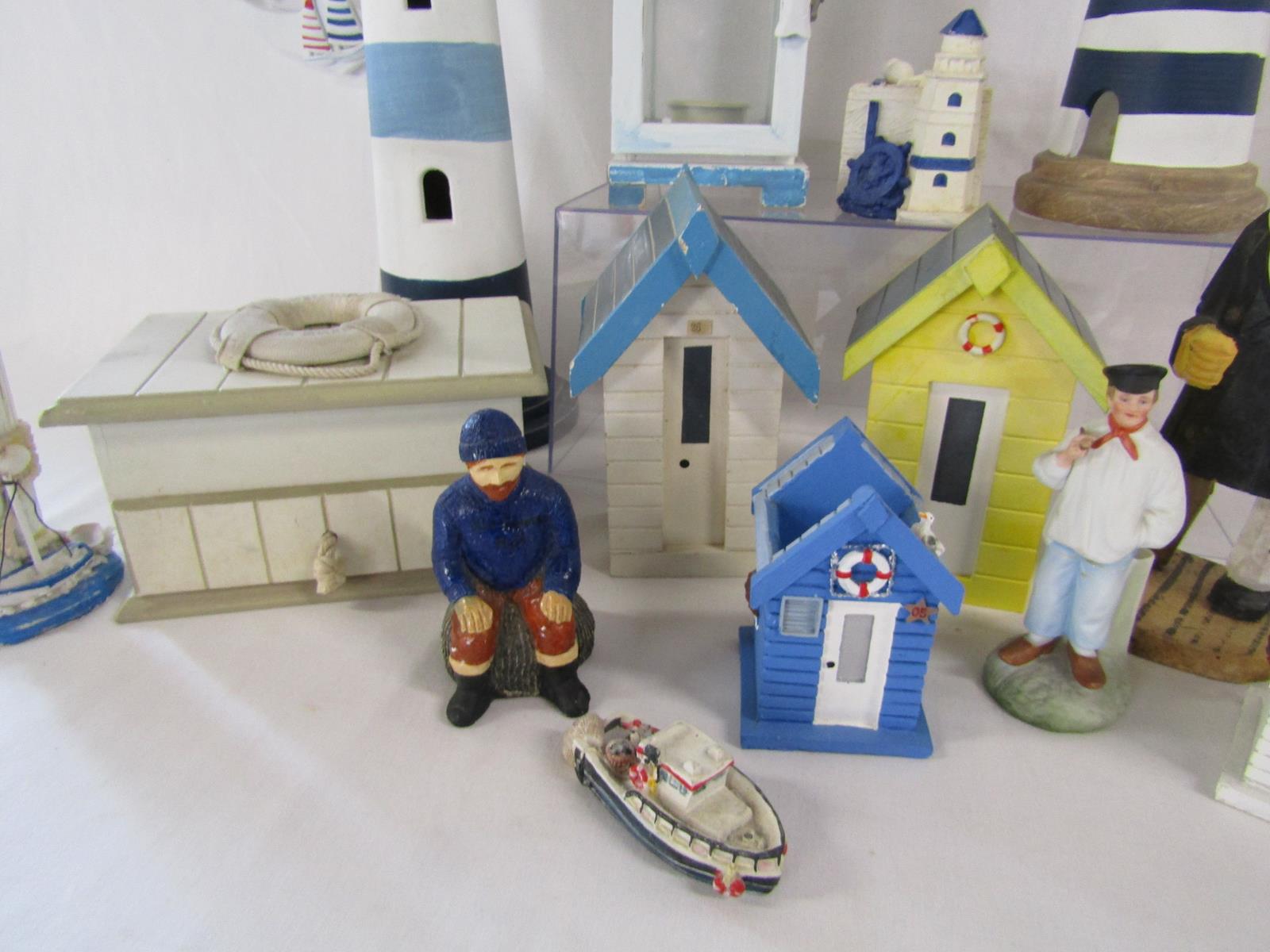 Collection of wooden beach ornaments includes, clock, lighthouses, beach hut money boxes, candle - Image 6 of 8