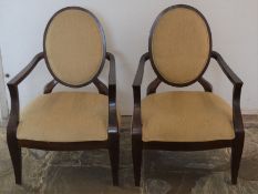 Pair of gold coloured upholstered open armchairs