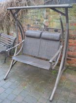 Swinging garden seat with covers
