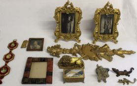 Picture frames, music box with stag design, painted terrier, ornate picture frames, brass lizard and