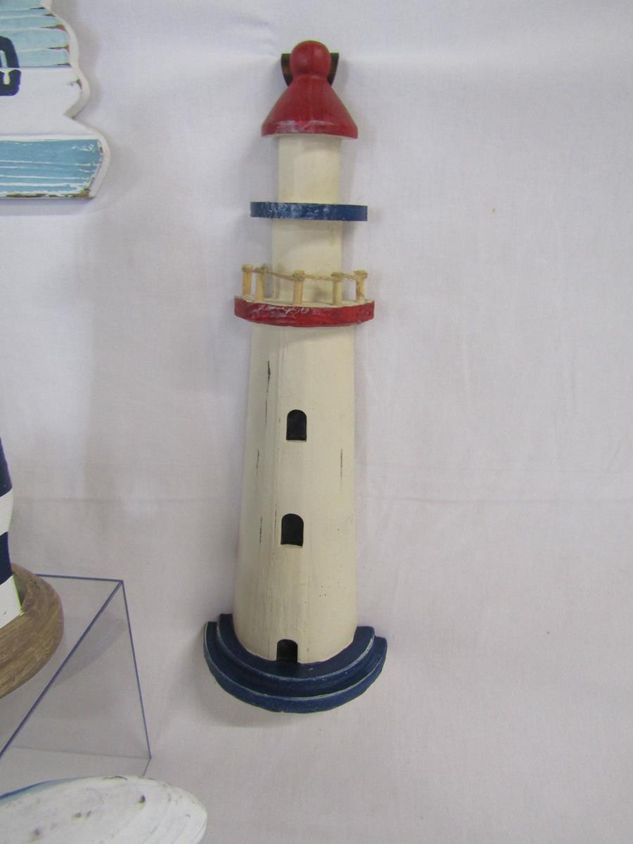 Collection of wooden beach ornaments includes, clock, lighthouses, beach hut money boxes, candle - Image 4 of 8