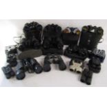 Collection of binoculars includes Tohyoh No. p-70-3471, Praktica, Vivitar, Hanimex, Panorama,