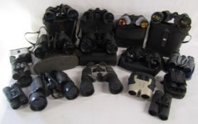 Collection of binoculars includes Tohyoh No. p-70-3471, Praktica, Vivitar, Hanimex, Panorama,