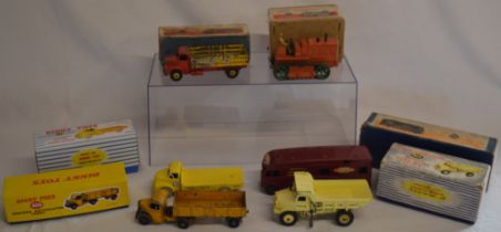 Boxed Dinky diecast toys, including 531 Leyland Comet Lorry in red and yellow, 563 heavy tractor,