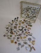 Selection of brooches with mirrored tray