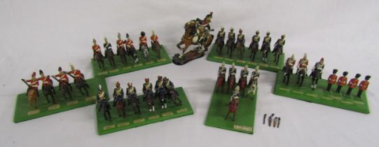 Collection of cast figures mounted onto wooden bases - Hussars and Guards also a larger mounted