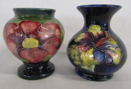 Moorcroft hibiscus vase on blue approx.13cm high and purple/blue clematis on green background
