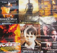 11 film posters, including American Pie, The Green Mile, Gladiator, The Bone Collector, Scream 3,