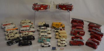 Approximately 39 Dinky Toys emergency service vehicles, comprising fire engines including 276
