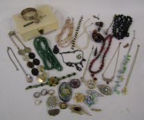 Collection of costume jewellery includes a small amount of silver with silver belt bangle