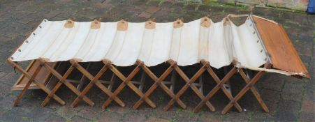 Early 20th century concertina campaign bed in oak