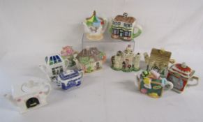 11 teapots includes Wade florist, Rington's, Leonardo carousel and knight at castle, Sadler Romeo