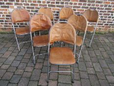 7 retro folding chairs re-covered in leather