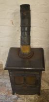 Small cast iron solid fuel burner