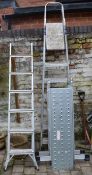2 sets of aluminum step ladders & a multi-purpose articulated ladder